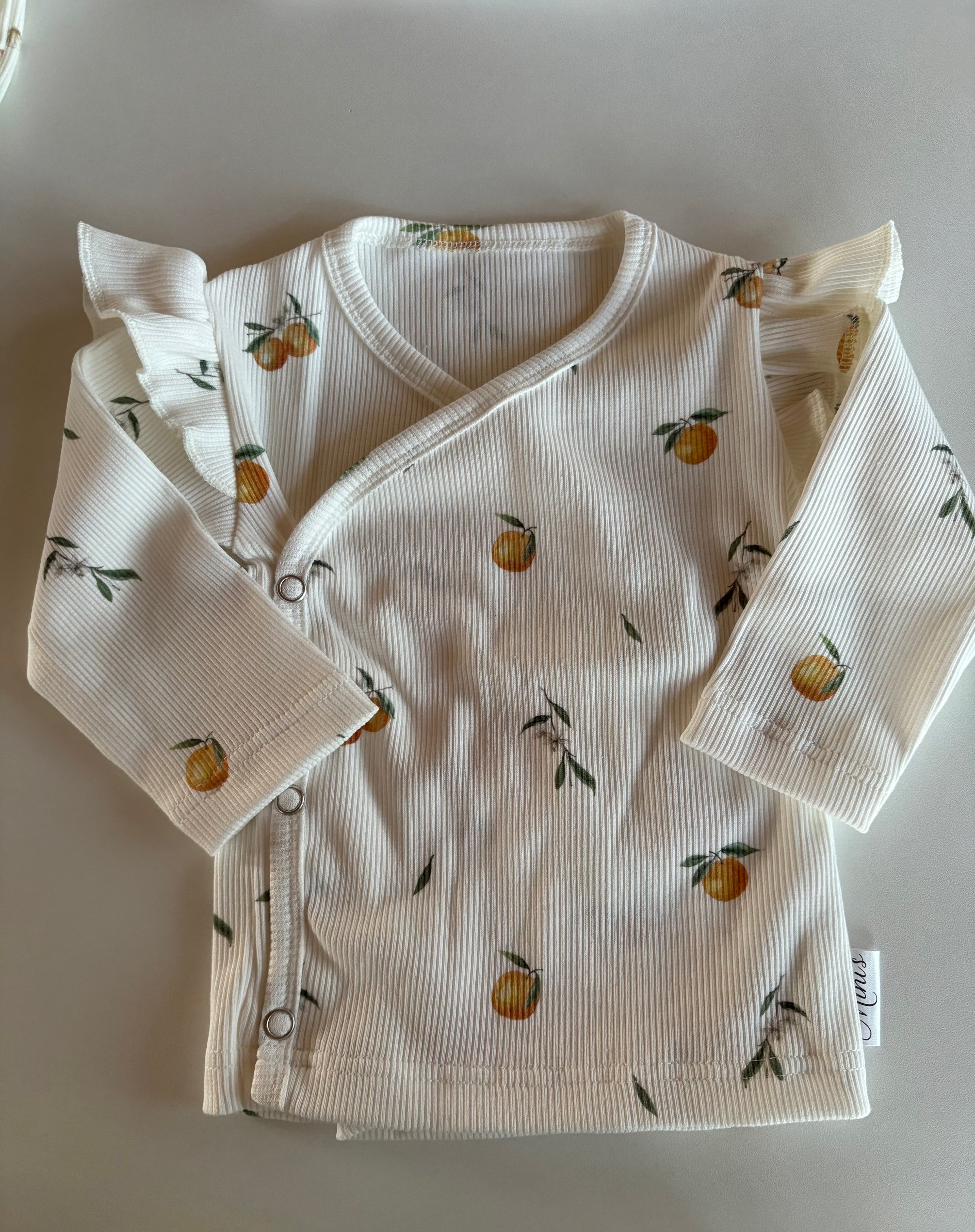 Overslagshirtje ruffle orange